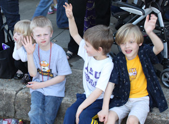 kids raising their hands